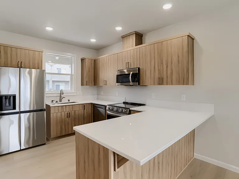 Kitchen with included fridge