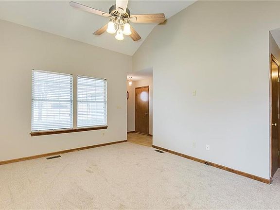 Vaulted Ceilings, Fresh Paint, & New Carpet