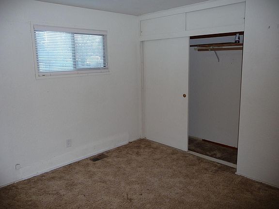 The master bedroom is good sized and overlooks the backyard.