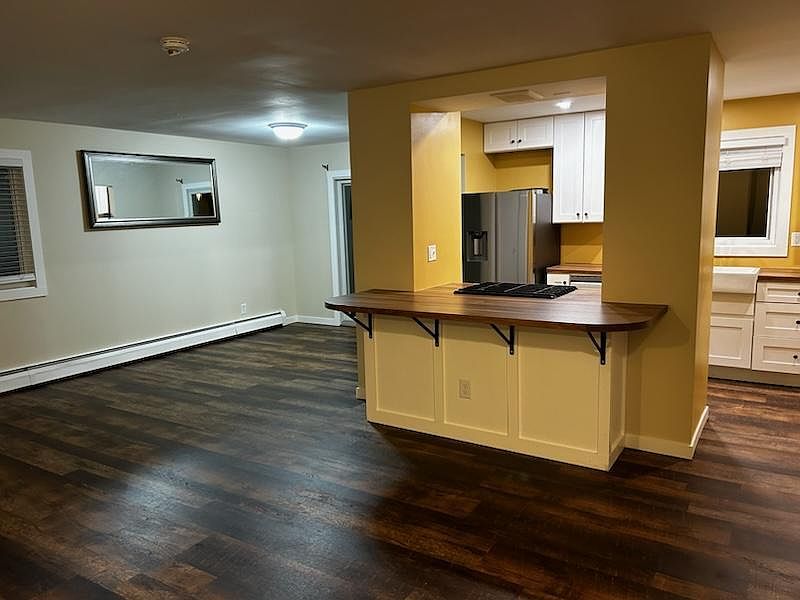 View of kitchen island from near the front door.
