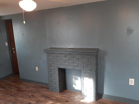 other view of primary room; entryway to kitchen and bath is at far left; back door to back porch is at left