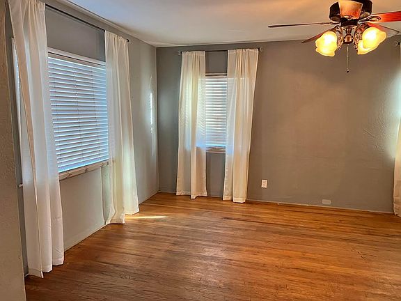 The remainder of the living room area looking from the front door entrance