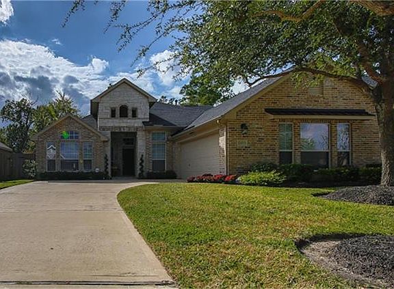 Curb Appeal and a well manicured low maintenance front.