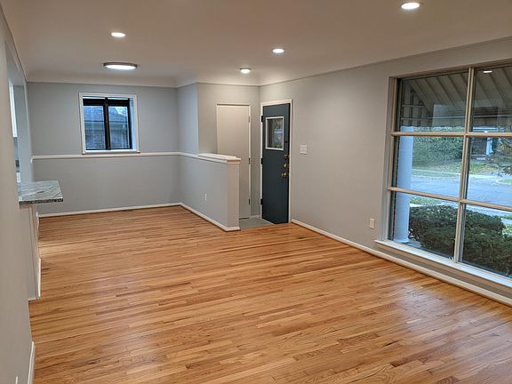 Dinning area with Breakfast bar - refinished floors