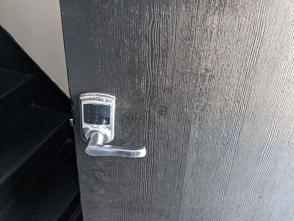 1st Floor - Entryway - Front Door closeup - electric keypad, so you never need to worry about losing your keys!