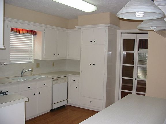 Great kitchen open to family room includes upgraded lighing and french doors.