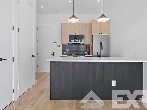 2nd image of 11-14 35th Ave #522