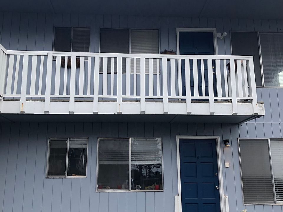 Outside picture of apartment. This is a small private owned property. Laundry room is free to use. Just to the right of apartment we have a beautiful setting area with table , chairs and bench that anybody can use. All yard maintenance paid.