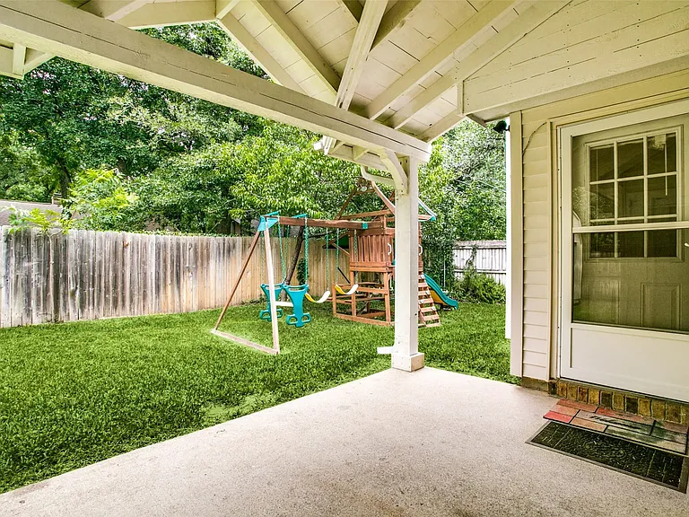 And your covered patio at the back. Private fenced backyard. Fresh sod put down and a shed on the side. This includes a vegetable plabting areaon the left and more yard on the right.