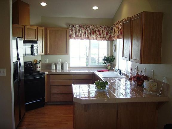 Sunny kitchen with two windows.