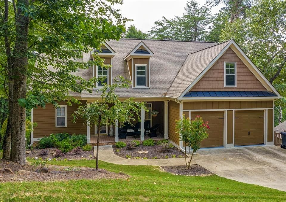 Image 1: Updated Craftsman Nestled on Wooded Lot