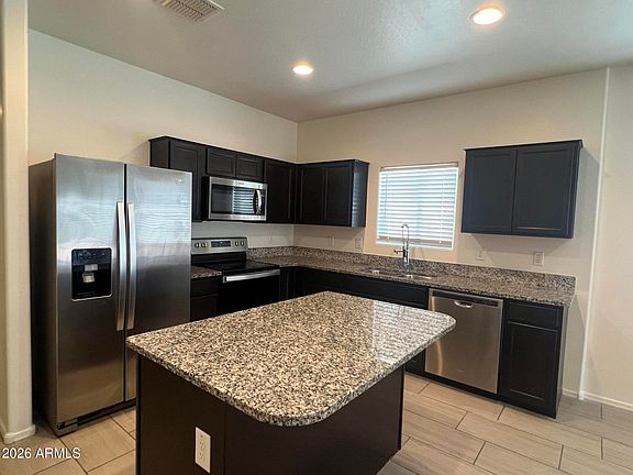5th image of 7833 W KERBY Avenue