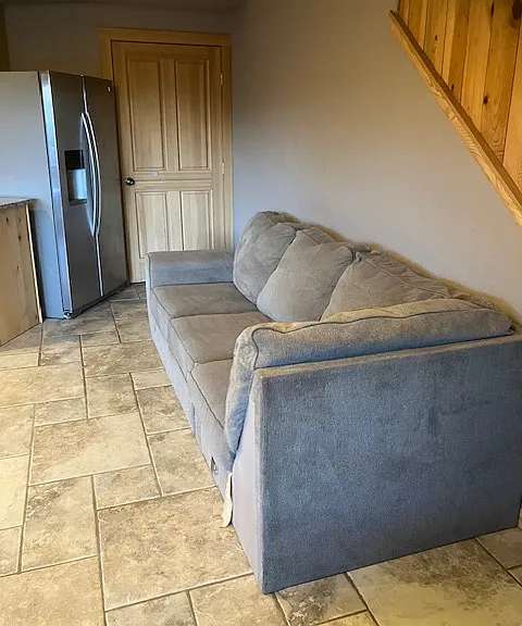 Living room couch. I'm in the process of updating to get a newer couch.