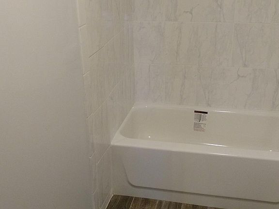 Renovated bathroom with new tile