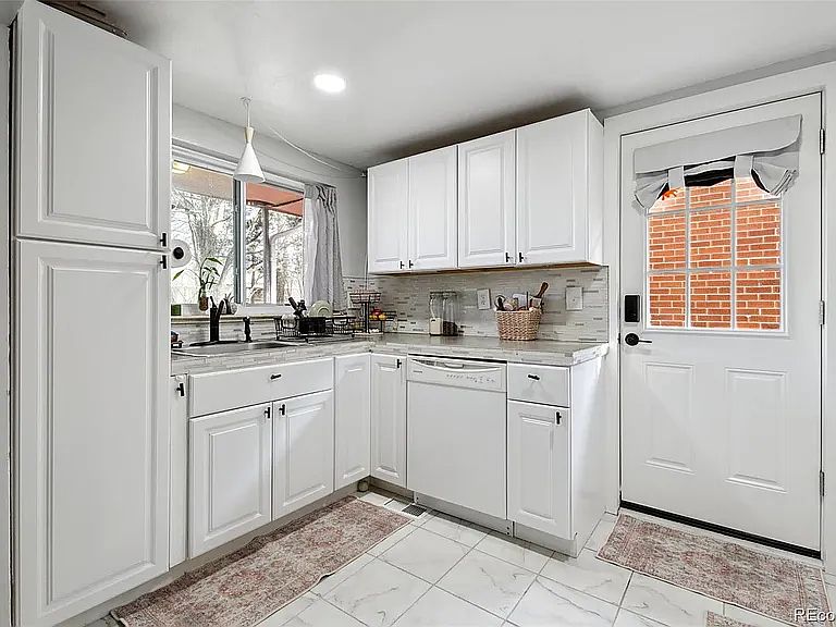 Kitchen with side door.