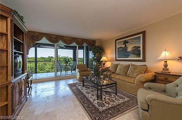 1st image of 7225 Pelican Bay Blvd Unit 304