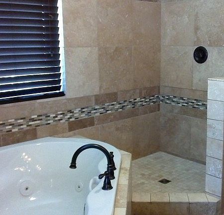 Master Bathroom
						:
						Travertine tile and whirlpool tub.