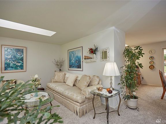 Another View Of Living Space Towards Open Dining Area