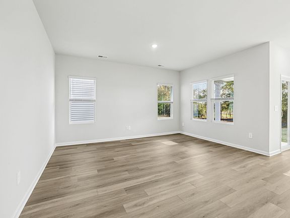 Great room in the Chandler floorplan at a Meritage Homes community in Angier, NC.