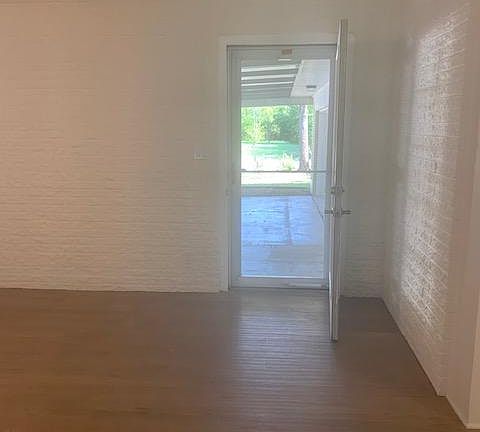 Entry from Carport to Family Room.