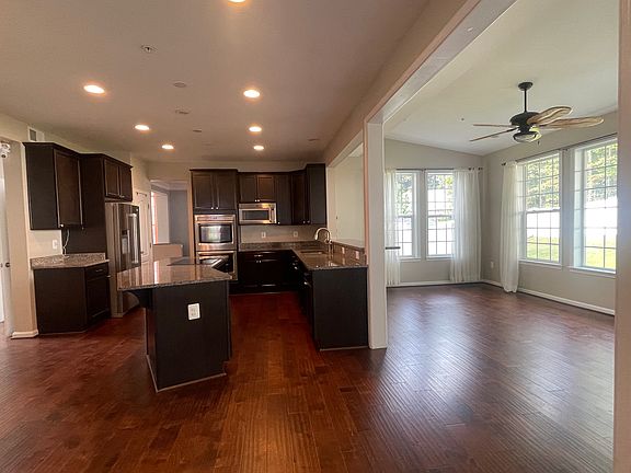 Kitchen and sunroom view from the family room