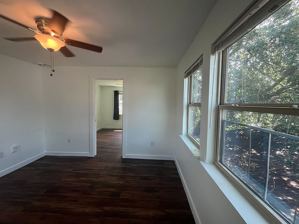 Living room looking into the secondary bedroom/office