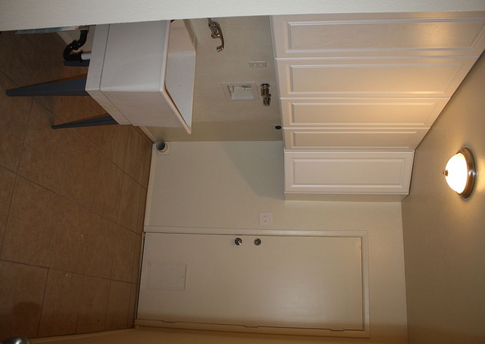 Laundry with tall cabinets