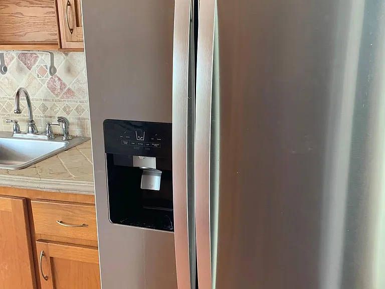 Brand New Fridge with ice maker and filter water.