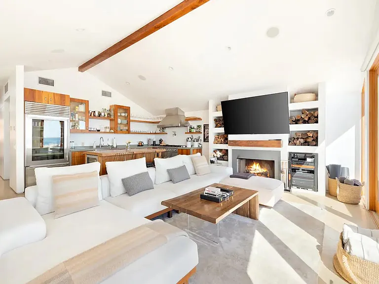 Take in the view of the ocean in the living space drenched in natural sunlight.