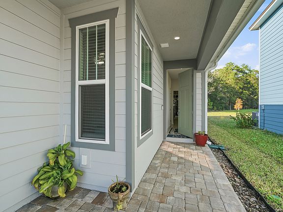 Covered and Paved Walk Up to Front Door.
