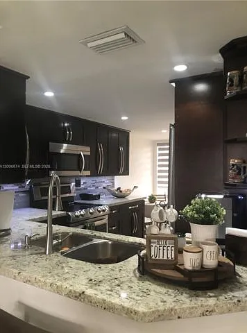 1155 NW 123rd Ct — Photo 11