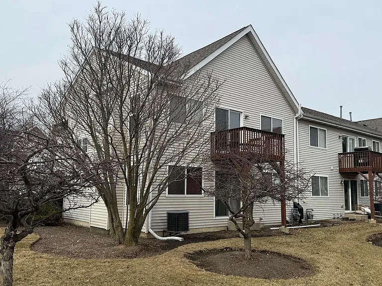 BACK SIDE OF THE TOWNHOUSE WITH BALCONY