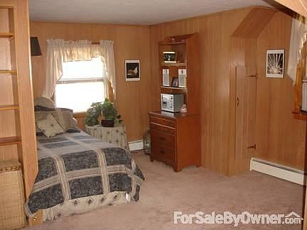 1 of the 4 bedrooms in this large cape.