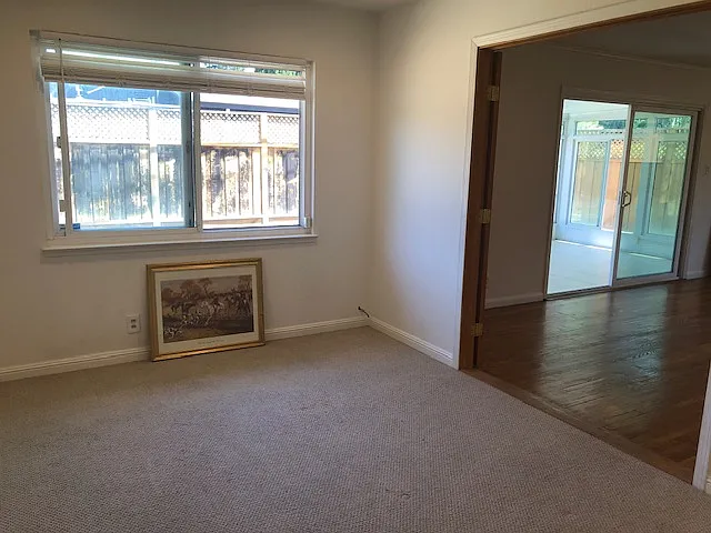 Bedroom #4, could be used as a home office, library, or a toy room. Double wooden French door could be closed for quite space or privacy. New carpets and fresh wall paint