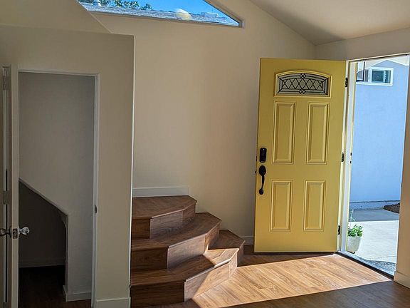 Entrance with steps up to sleeping loft and "Harry Potter" under steps closet.