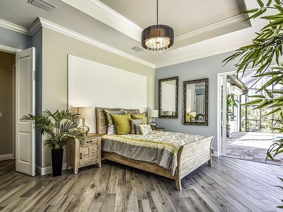 Master Suite with french doors and 2 walls of glass pocket d