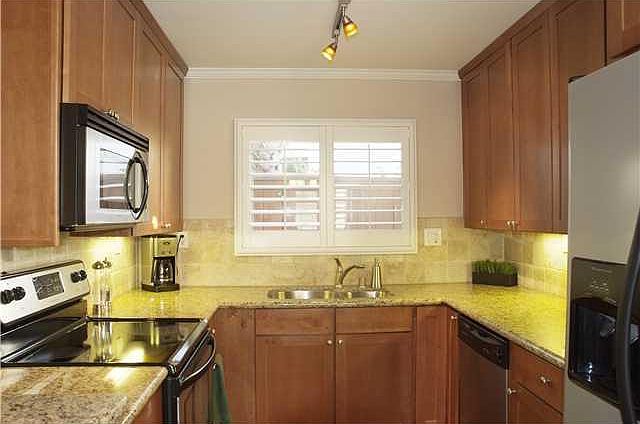 Kitchen. The kitchen is quite large with Microwave, Dishwasher and range.