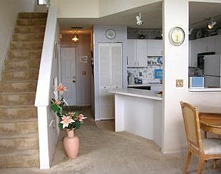 Open plan kitchen w/breakfast bar..