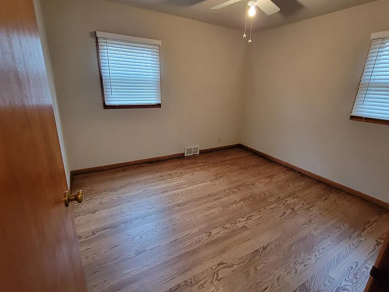 Bedroom 3 main level w/finished HWF