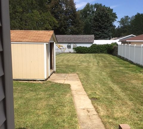 Large fenced yard & shed!