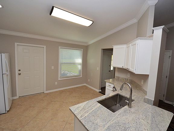 Kitchen looking toward garage door