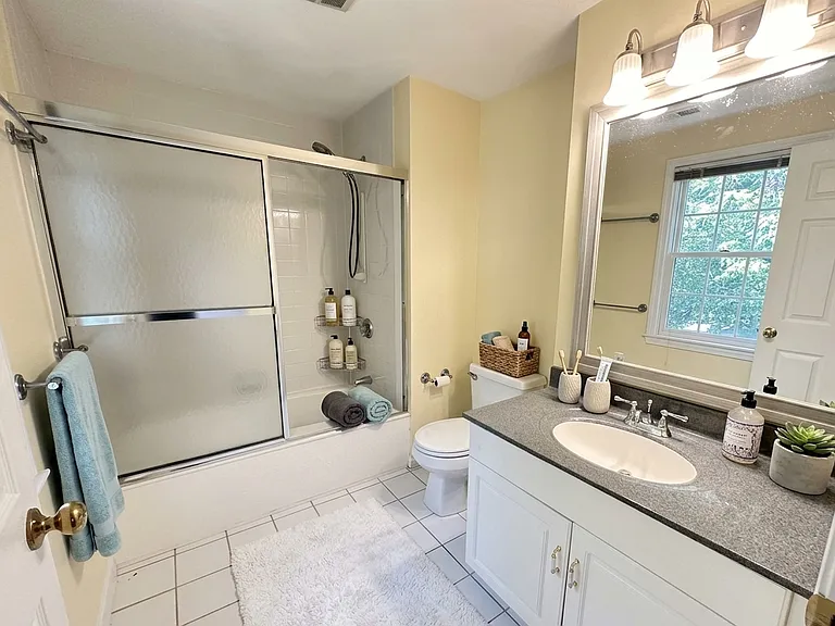 COMING SOON: FRESH NEW FLOORING replacing second-floor carpets! Upstairs: 3 large bedrooms, full bath, and PRIMARY BEDROOM with ENSUITE BATH, plus second-floor washer/dryer. Virtually Staged.