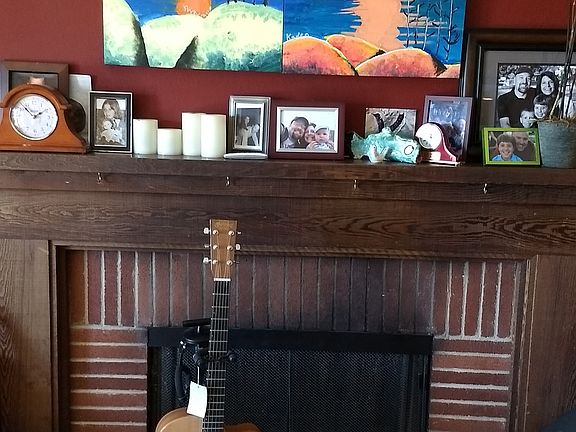 Living room w fireplace & Marvin sliding doors