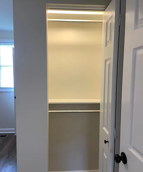 Additional closet with 2 rods and light