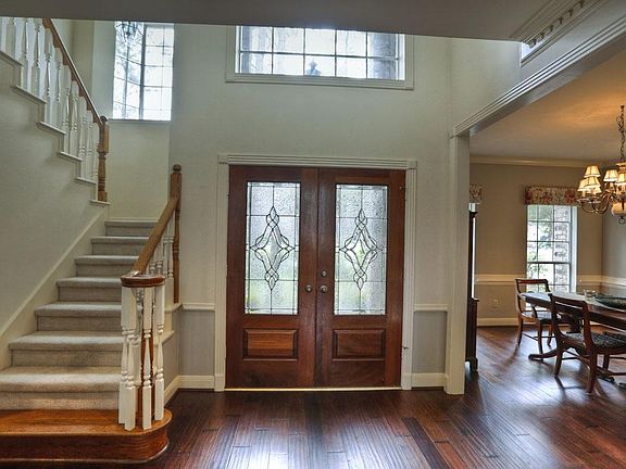 New Spanish Leather wood flooring throughout downstairs.