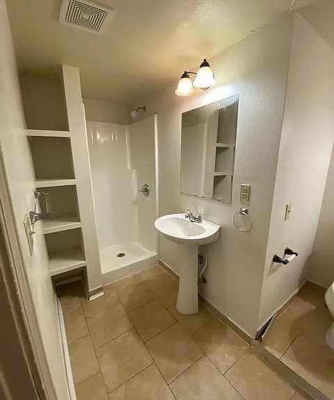 updated photos coming. new flooring and more spacious sink basin.