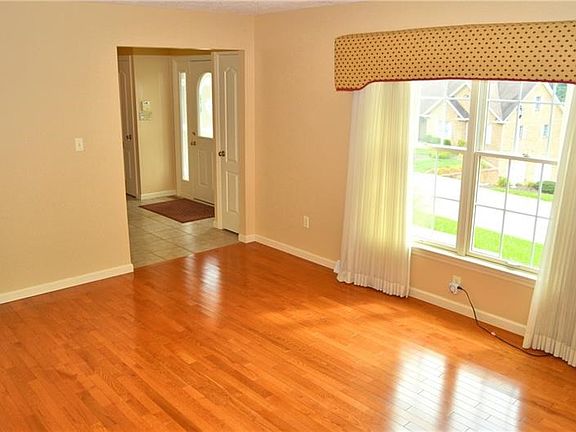 Den 12' X 16' - Featuring oak hardwood floors and double windows for plenty of natural daylight.