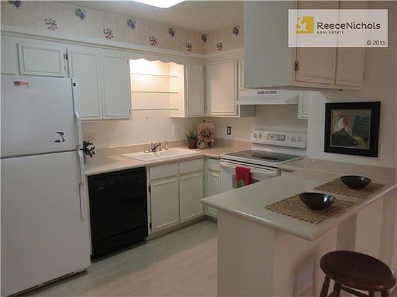 Enjoy an open kitchen with breakfast counter, smooth top range and refrigerator included.
