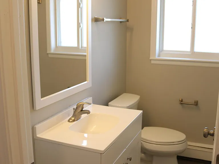 Completely remodeled bathroom includes a Kohler toilet, moen fixtures and new tub and surround.