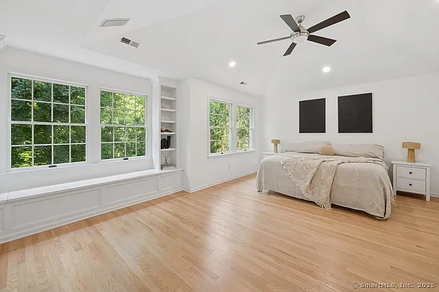 Primary Bedroom with built in window seat